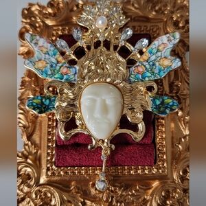 Ornate Gold-tone Face Brooch with Floral Enamel